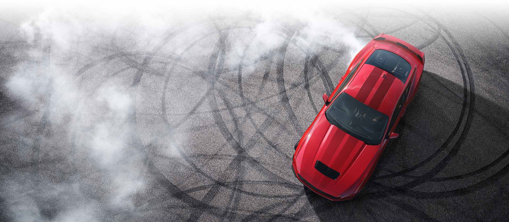 Overhead view of a 2024 Ford Mustang® model with tire tracks on pavement | Pierre Ford of Hermiston in Hermiston OR