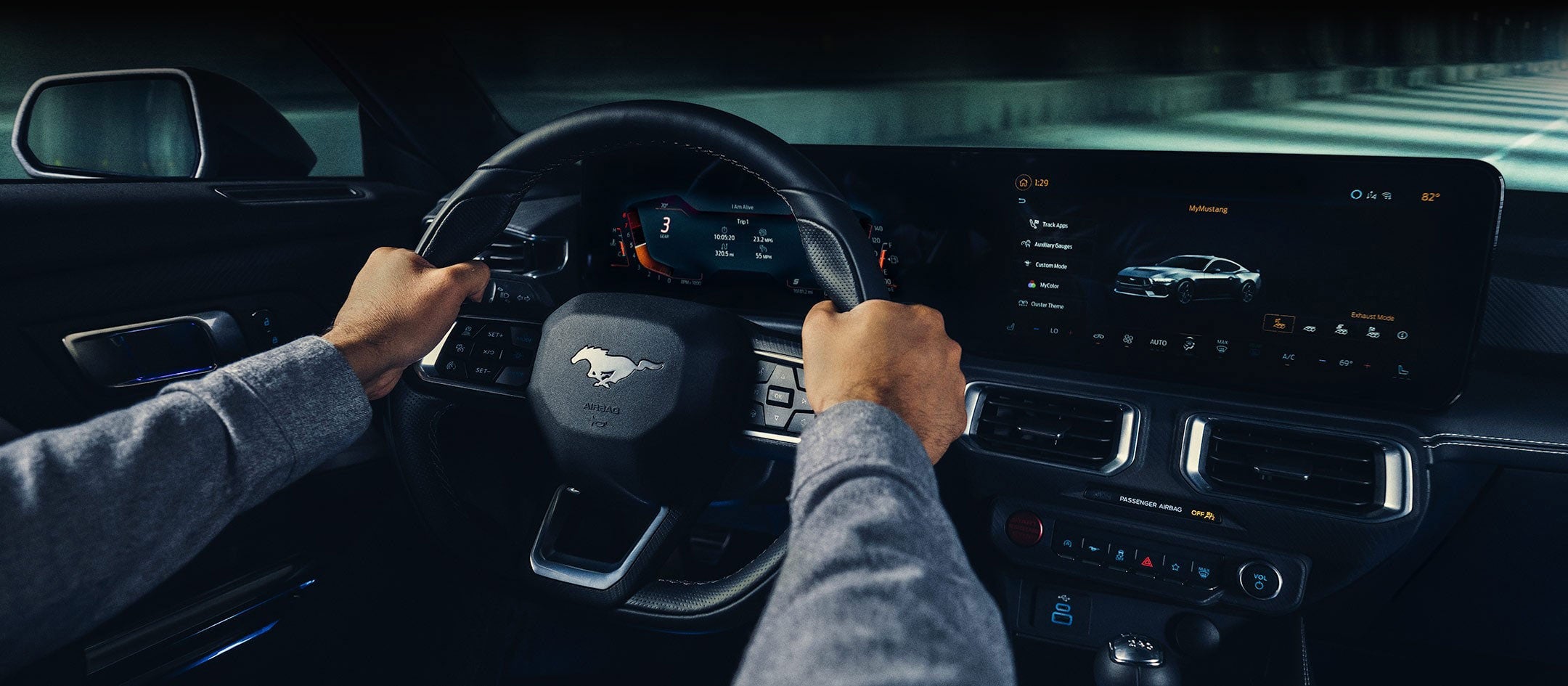 A 2024 Ford Mustang® model interior with a person driving | Pierre Ford of Hermiston in Hermiston OR